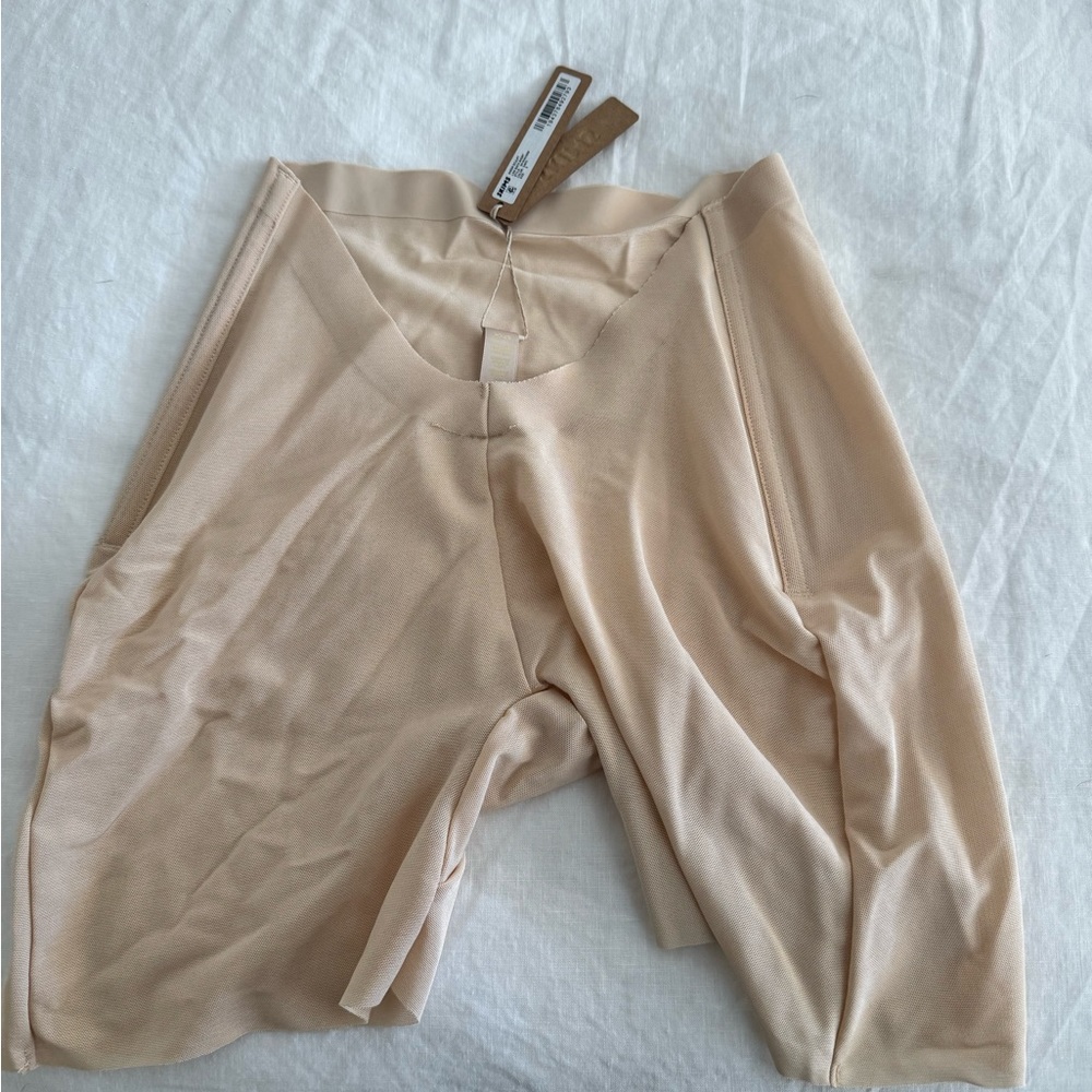 SKIMS Sheer Sculpt Low Back Short in color Sand size small